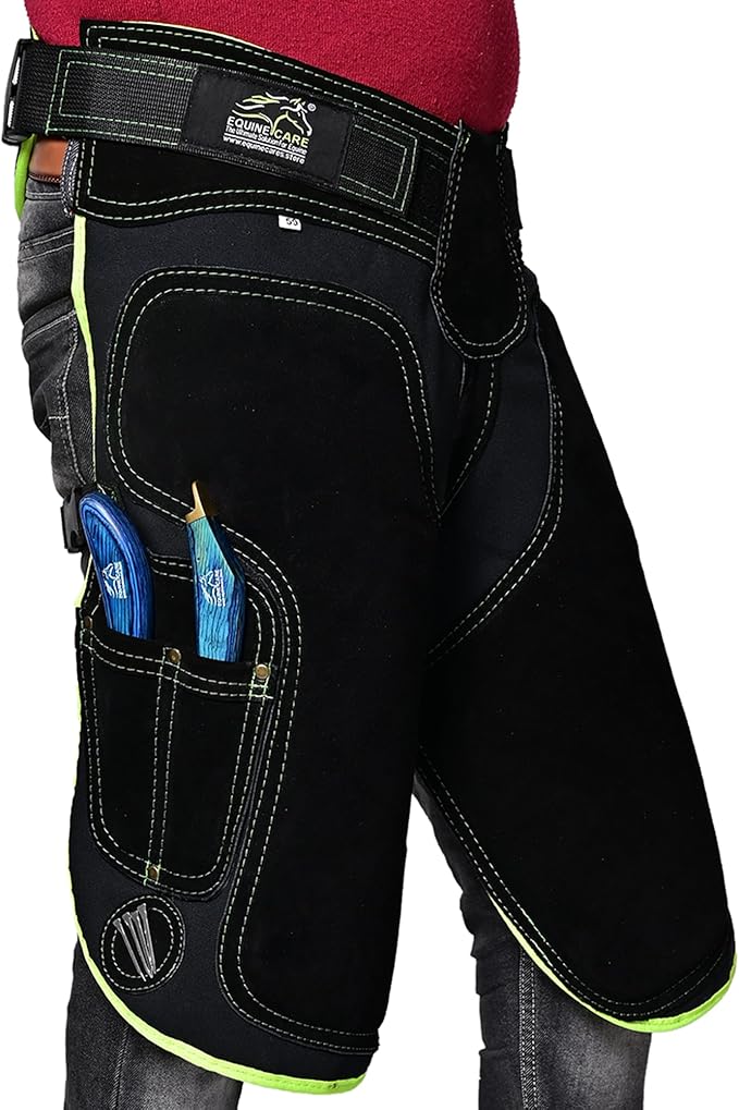 Equine Care Women’s Farrier Apron Chaps 23″ – Leather & Canvas, Adjustable 28–52″ Waist, EVA Padded Knees, Lumbar Support, 4 Knife Pockets & Nail Magnets for Hoof Trimming (Black with Green Piping)