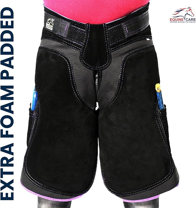 Equine Care Women’s Farrier Apron Chaps 23″ – Leather & Canvas, Adjustable 28–52″ Waist, EVA Padded Knees, Lumbar Support, 4 Knife Pockets & Nail Magnets for Hoof Trimming (Black with Purple Piping)